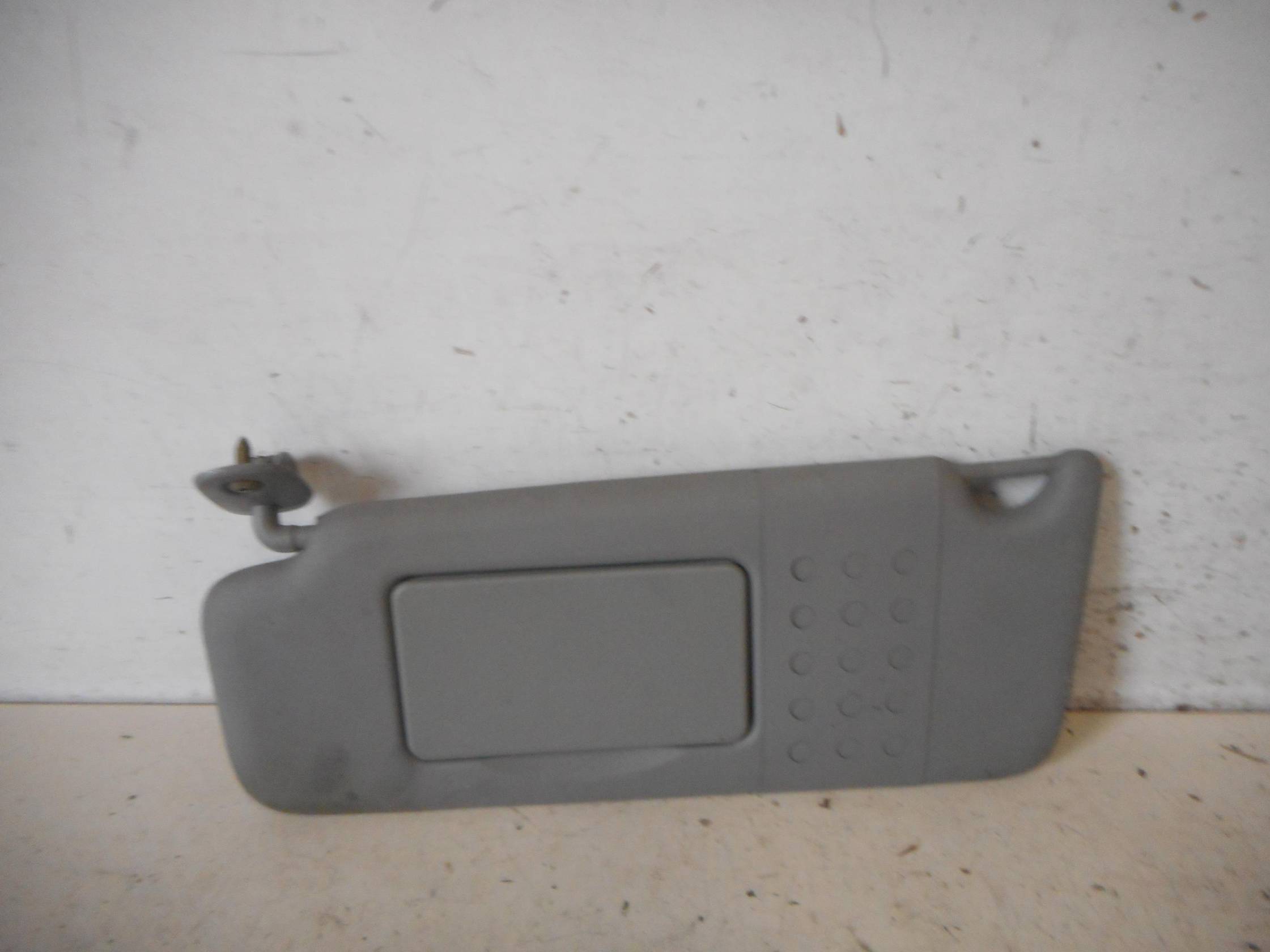 Aletta parasole parabrezza sx.